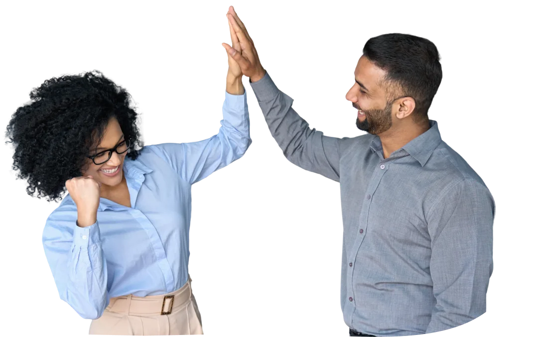 Two people giving a high-five, celebrating teamwork and success